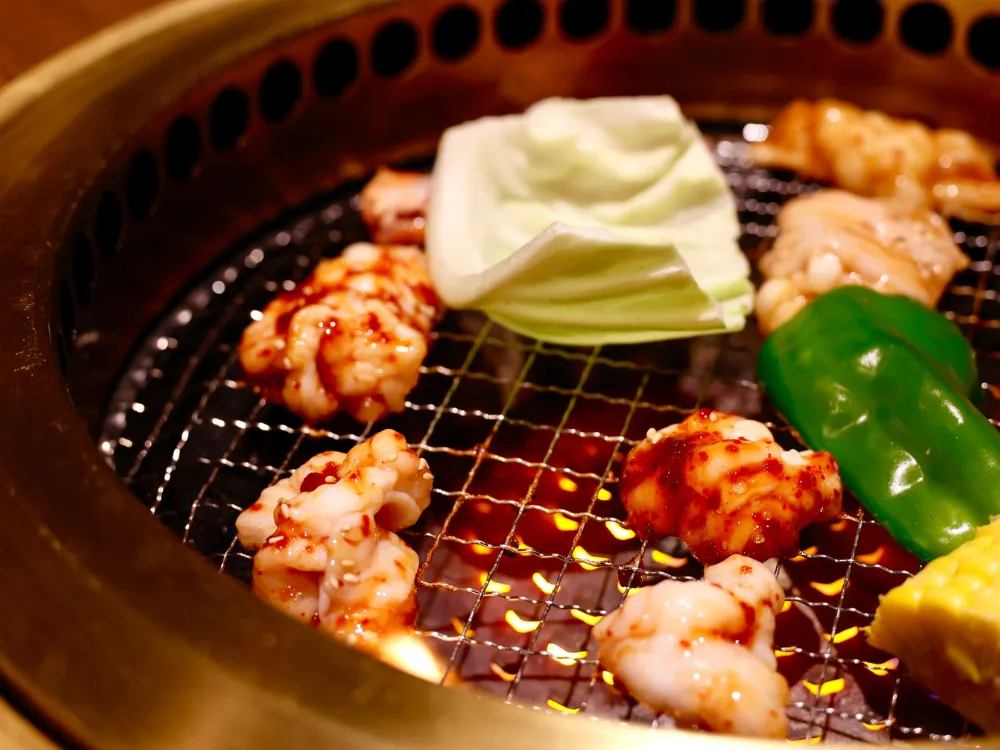 焼肉店の調理風景 - TrendPackage導入事例